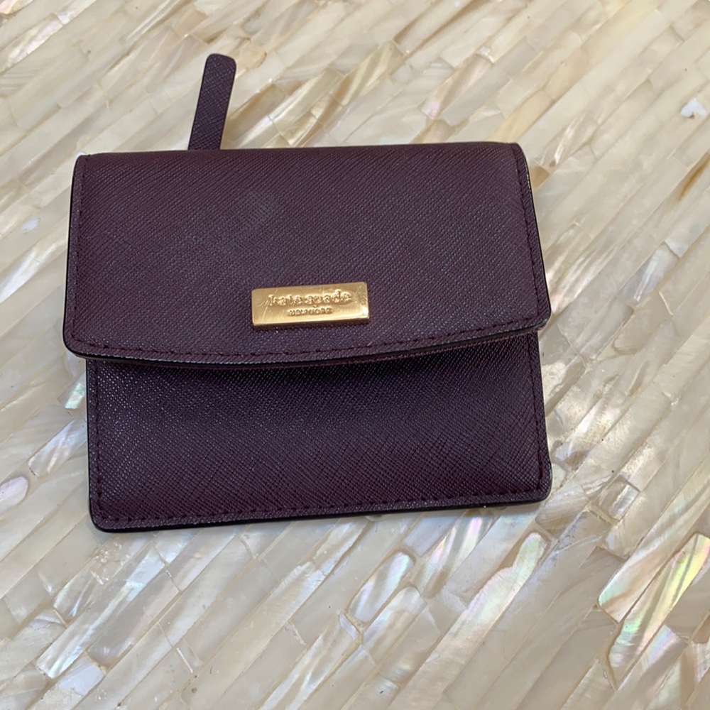 Small purple Kate spade wallet with key ring